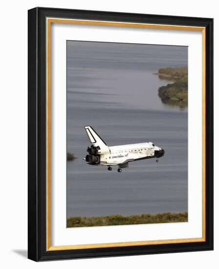 Space Shuttle Discovery Glides over the Banana River to a Landing on Kennedy Space Center's Runway-null-Framed Photographic Print