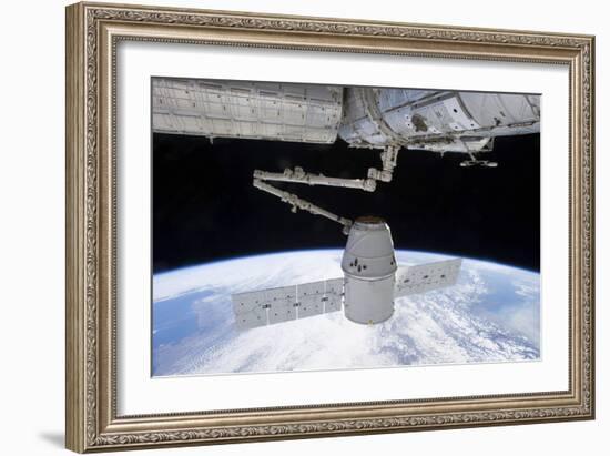 Spacex Dragon During its Docking with the International Space Station-null-Framed Photographic Print