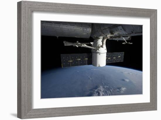 Spacex Dragon During its Docking with the International Space Station-null-Framed Photographic Print