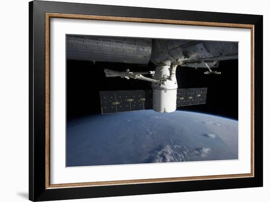 Spacex Dragon During its Docking with the International Space Station-null-Framed Photographic Print