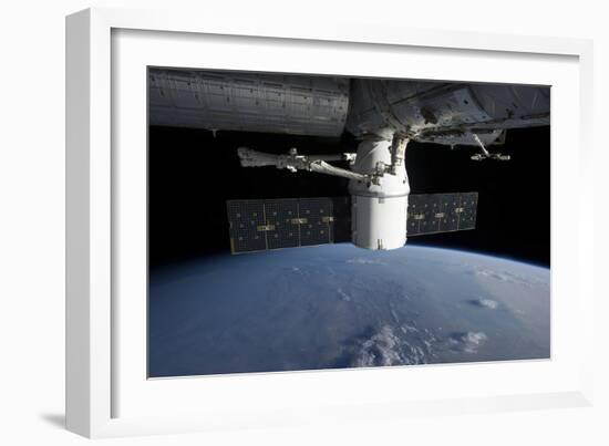 Spacex Dragon During its Docking with the International Space Station-null-Framed Photographic Print