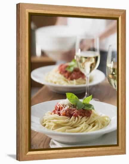 Spaghetti with Tomato Sauce and Glasses of White Wine on Table-null-Framed Premier Image Canvas