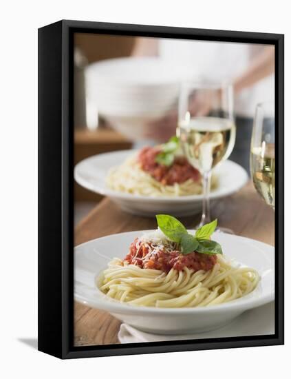 Spaghetti with Tomato Sauce and Glasses of White Wine on Table-null-Framed Premier Image Canvas