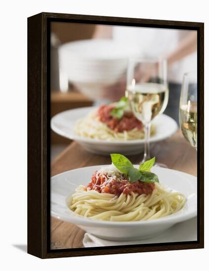 Spaghetti with Tomato Sauce and Glasses of White Wine on Table-null-Framed Premier Image Canvas