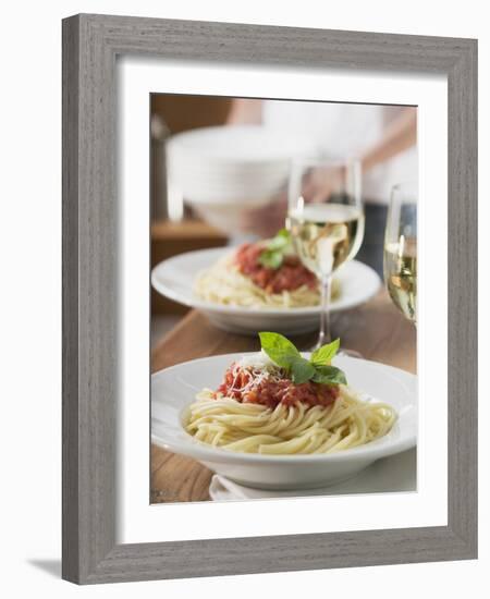 Spaghetti with Tomato Sauce and Glasses of White Wine on Table-null-Framed Photographic Print