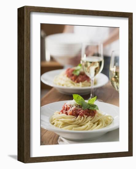 Spaghetti with Tomato Sauce and Glasses of White Wine on Table-null-Framed Photographic Print