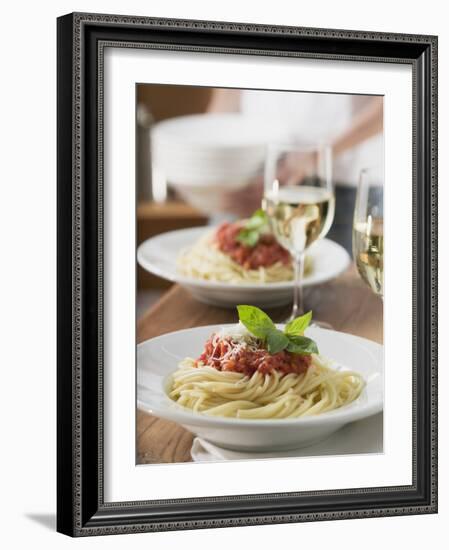 Spaghetti with Tomato Sauce and Glasses of White Wine on Table-null-Framed Photographic Print