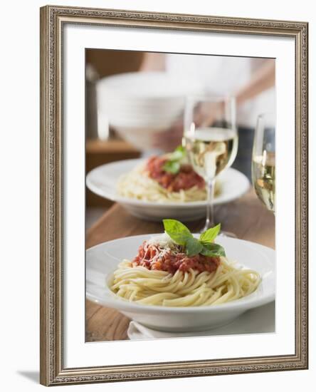 Spaghetti with Tomato Sauce and Glasses of White Wine on Table-null-Framed Photographic Print