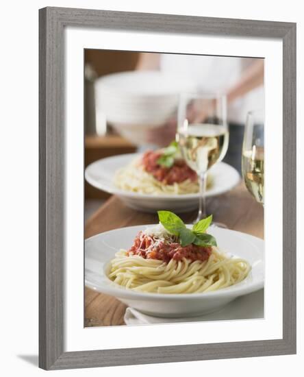 Spaghetti with Tomato Sauce and Glasses of White Wine on Table-null-Framed Photographic Print