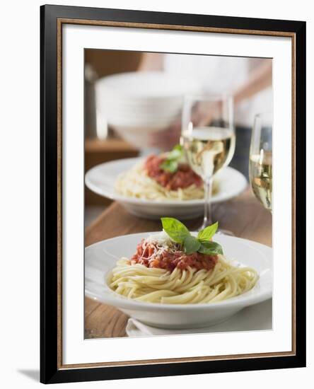 Spaghetti with Tomato Sauce and Glasses of White Wine on Table-null-Framed Photographic Print