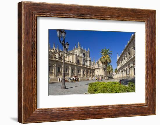 Spain, Andalusia, Seville, Cathedral, Street, Horse-Drawn Carriage-Chris Seba-Framed Photographic Print