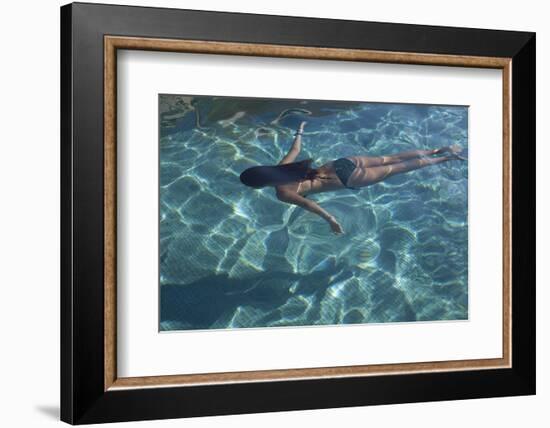Spain, Ibiza, Cala Jondal. Girl Swimming at Maison De Bang Bang Villa-Katie Garrod-Framed Photographic Print