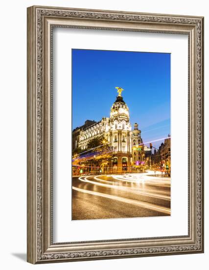 Spain, Madrid. Cityscape at Dusk with Famous Metropolis Building-Matteo Colombo-Framed Photographic Print