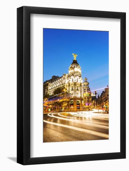 Spain, Madrid. Cityscape at Dusk with Famous Metropolis Building-Matteo Colombo-Framed Photographic Print