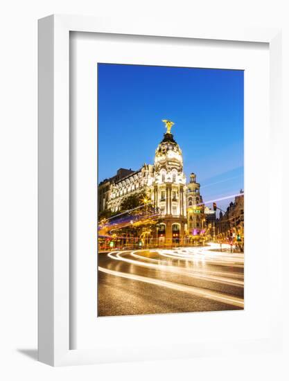 Spain, Madrid. Cityscape at Dusk with Famous Metropolis Building-Matteo Colombo-Framed Photographic Print