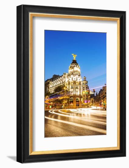 Spain, Madrid. Cityscape at Dusk with Famous Metropolis Building-Matteo Colombo-Framed Photographic Print