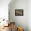 Spain, Sevilla, Andalucia Geraniums hang over iron balconies of traditional houses-Merrill Images-Framed Premier Image Canvas displayed on a wall