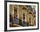 Spain, Sevilla, Andalucia Geraniums hang over iron balconies of traditional houses-Merrill Images-Framed Photographic Print