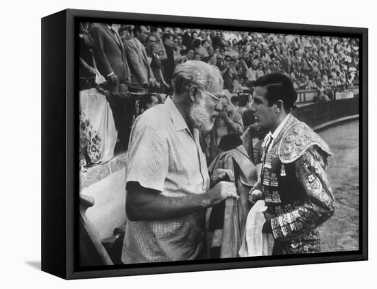 Spanish Matador Antonio Ordonez with Friend, Author Ernest Hemingway in Arena Before Bullfight-Loomis Dean-Framed Premier Image Canvas