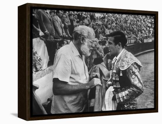 Spanish Matador Antonio Ordonez with Friend, Author Ernest Hemingway in Arena Before Bullfight-Loomis Dean-Framed Premier Image Canvas