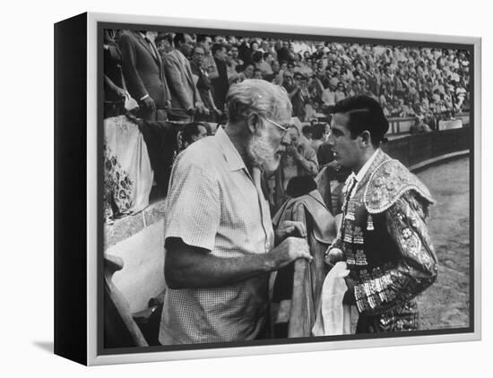 Spanish Matador Antonio Ordonez with Friend, Author Ernest Hemingway in Arena Before Bullfight-Loomis Dean-Framed Premier Image Canvas