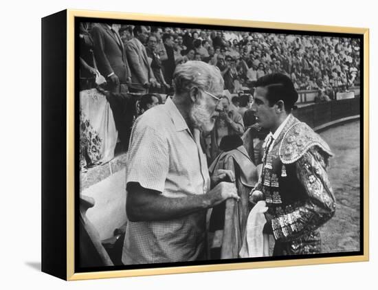 Spanish Matador Antonio Ordonez with Friend, Author Ernest Hemingway in Arena Before Bullfight-Loomis Dean-Framed Premier Image Canvas