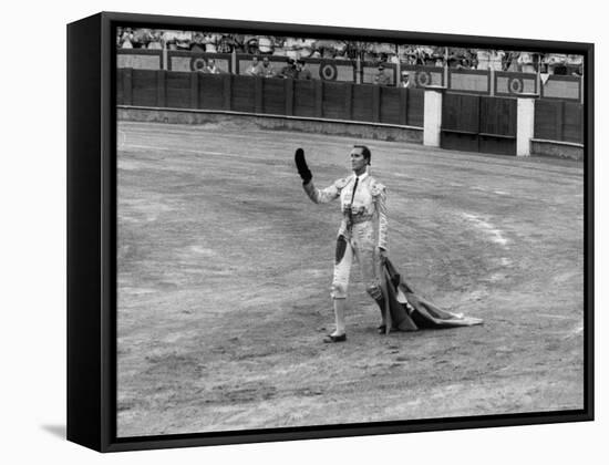 Spanish Matador Luis Miguel Dominguin Doffing His Cap as He Acknowledges the Applause of the Crown-Loomis Dean-Framed Premier Image Canvas