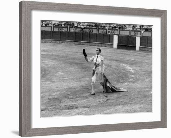 Spanish Matador Luis Miguel Dominguin Doffing His Cap as He Acknowledges the Applause of the Crown-Loomis Dean-Framed Premium Photographic Print