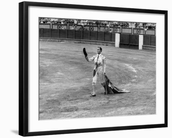 Spanish Matador Luis Miguel Dominguin Doffing His Cap as He Acknowledges the Applause of the Crown-Loomis Dean-Framed Premium Photographic Print
