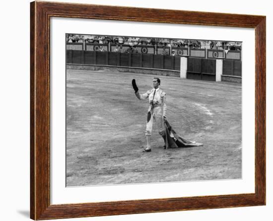 Spanish Matador Luis Miguel Dominguin Doffing His Cap as He Acknowledges the Applause of the Crown-Loomis Dean-Framed Premium Photographic Print