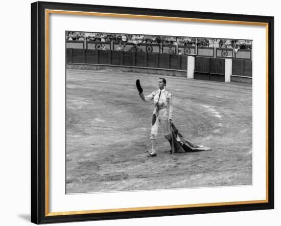 Spanish Matador Luis Miguel Dominguin Doffing His Cap as He Acknowledges the Applause of the Crown-Loomis Dean-Framed Premium Photographic Print