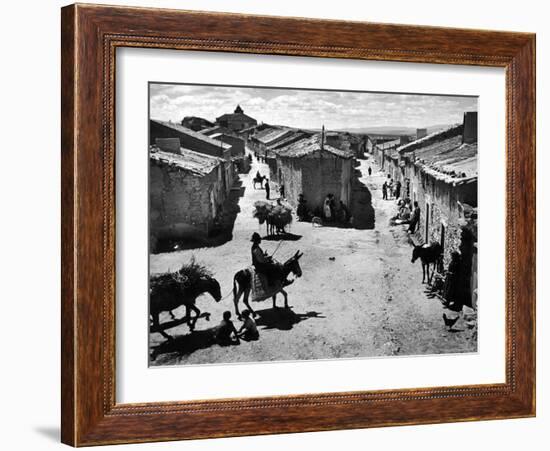 Spanish Village Showing Rows of Crude Stone and Adobe Houses-W^ Eugene Smith-Framed Photographic Print