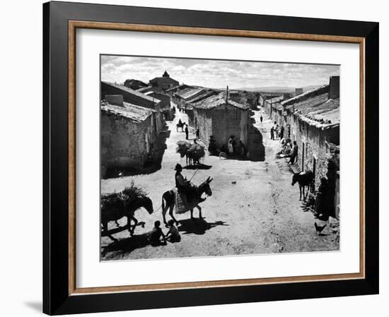 Spanish Village Showing Rows of Crude Stone and Adobe Houses-W^ Eugene Smith-Framed Photographic Print