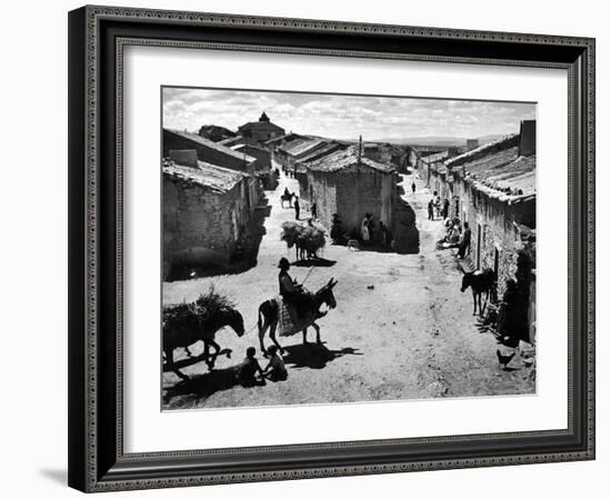 Spanish Village Showing Rows of Crude Stone and Adobe Houses-W^ Eugene Smith-Framed Photographic Print