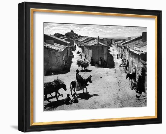 Spanish Village Showing Rows of Crude Stone and Adobe Houses-W^ Eugene Smith-Framed Photographic Print