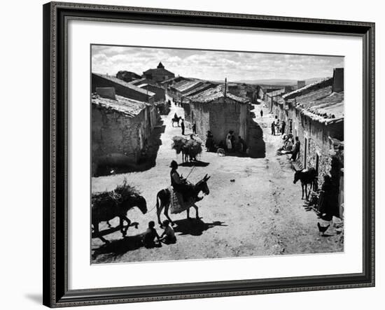 Spanish Village Showing Rows of Crude Stone and Adobe Houses-W^ Eugene Smith-Framed Photographic Print