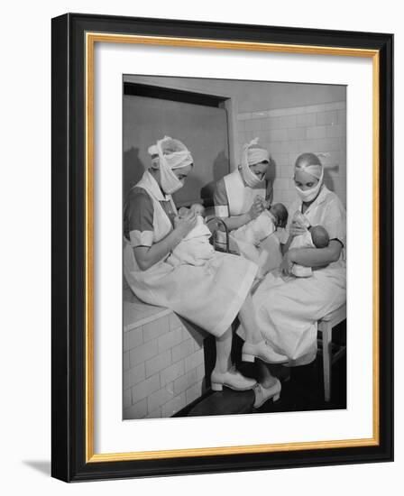 Special Nursery Nurses Wearing Masks as They Bottle-Feed Fully Developed Premature Babies-Hansel Mieth-Framed Photographic Print