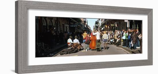 Spectator Looking at Street Musician Performing, Bourbon Street, New Orleans, Louisiana, USA-null-Framed Photographic Print