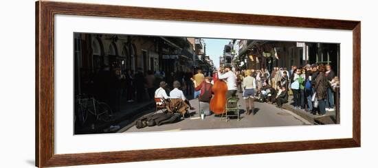 Spectator Looking at Street Musician Performing, Bourbon Street, New Orleans, Louisiana, USA-null-Framed Photographic Print