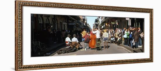 Spectator Looking at Street Musician Performing, Bourbon Street, New Orleans, Louisiana, USA-null-Framed Photographic Print