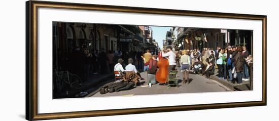 Spectator Looking at Street Musician Performing, Bourbon Street, New Orleans, Louisiana, USA-null-Framed Photographic Print