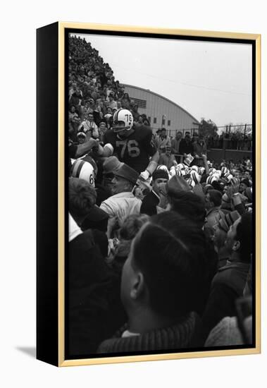 Spectators at the Minnesota- Iowa Game, Minneapolis, Minnesota, November 1960-Francis Miller-Framed Premier Image Canvas