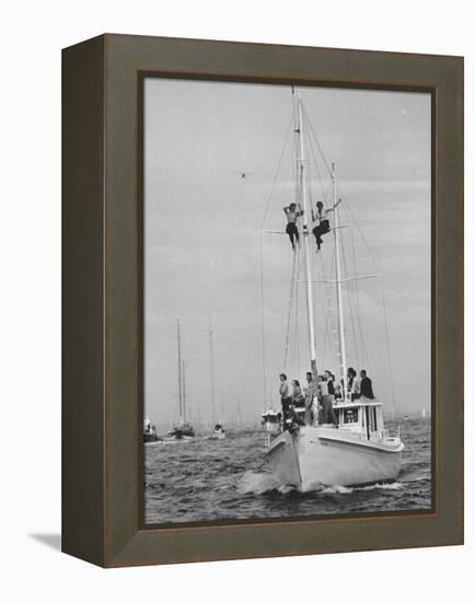 Spectators Watching the America's Cup on a Sailing Boat-Peter Stackpole-Framed Premier Image Canvas