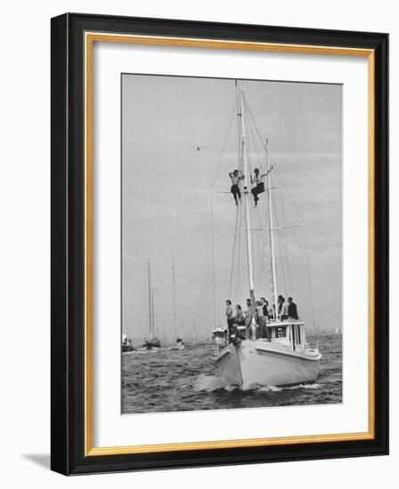 Spectators Watching the America's Cup on a Sailing Boat-Peter Stackpole-Framed Photographic Print