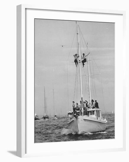 Spectators Watching the America's Cup on a Sailing Boat-Peter Stackpole-Framed Photographic Print