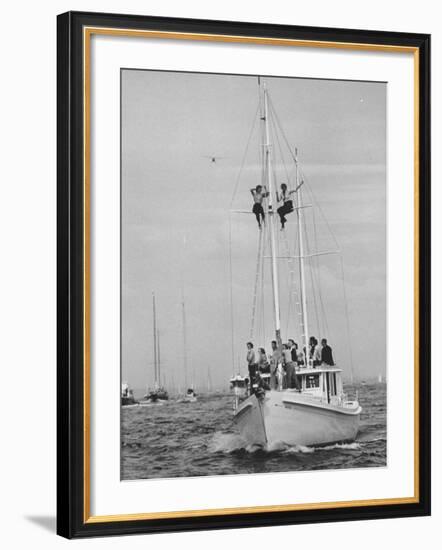 Spectators Watching the America's Cup on a Sailing Boat-Peter Stackpole-Framed Photographic Print