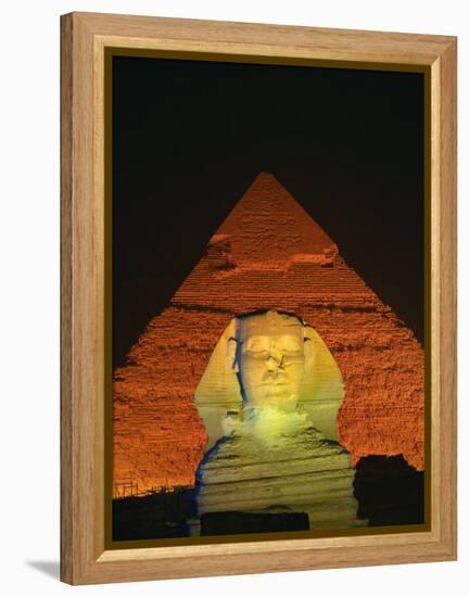 Sphinx and One of the Pyramids Illuminated at Night, Giza, Cairo, Egypt-Nigel Francis-Framed Premier Image Canvas