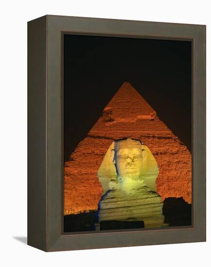 Sphinx and One of the Pyramids Illuminated at Night, Giza, Cairo, Egypt-Nigel Francis-Framed Premier Image Canvas