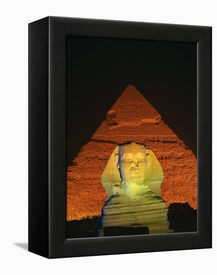 Sphinx and One of the Pyramids Illuminated at Night, Giza, Cairo, Egypt-Nigel Francis-Framed Premier Image Canvas