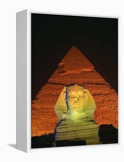 Sphinx and One of the Pyramids Illuminated at Night, Giza, Cairo, Egypt-Nigel Francis-Framed Premier Image Canvas